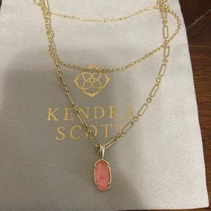 Triple strand Kendra Scott necklace.
